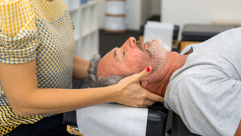 Man receiving chiropractic adjustment for immunity boost