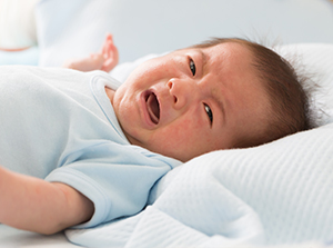 Baby suffering from colic